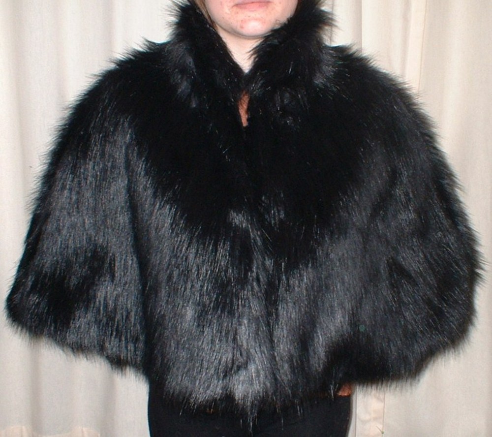 Faux fur outlet cape with hood